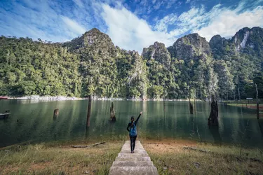 woman on dock in beautiful nature