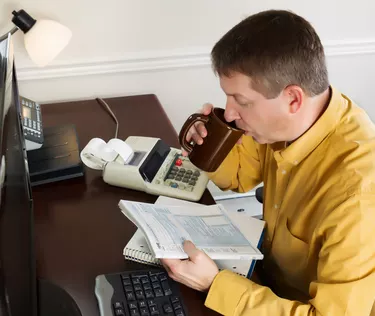 man doing taxes