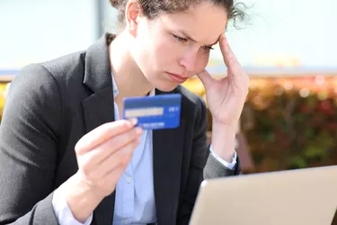 Worried businesswoman complaining buying online