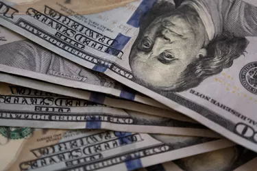 full frame of spread of crisp $100 bills