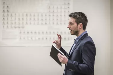 Professor talking in college classroom