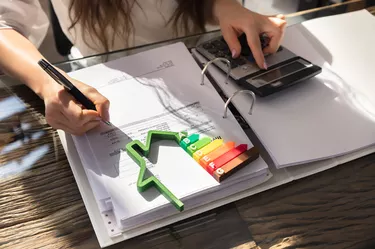 Woman Calculating with ABC model