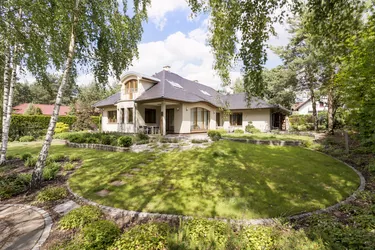 Modern villa housefront in the garden