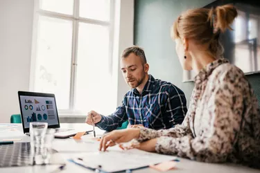 Experts in office working on investment banking