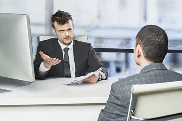 Manager discussing a problem with employee