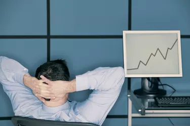 Businessman reclining in office
