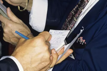 New York Stock Exchange transactions, close-up of traders hands
