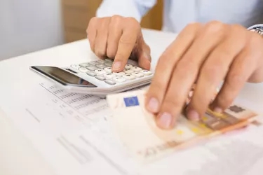 Man doing his accounting, financial adviser working