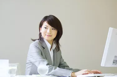 Businesswoman working at her desk