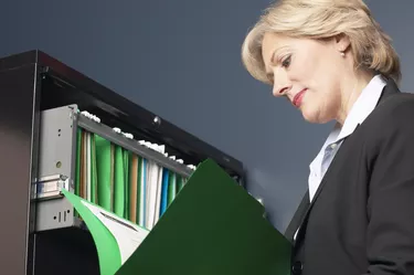 Woman reading file