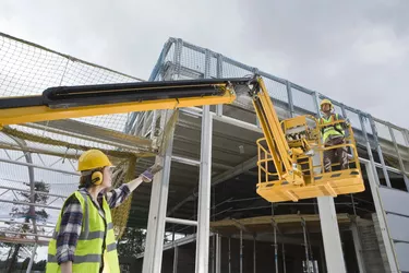 Construction workers with crane
