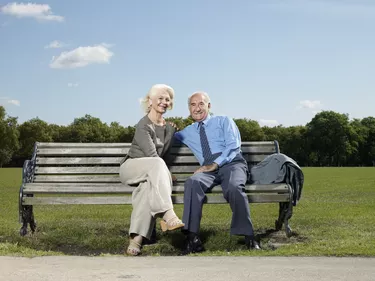 Elderly couple on a park bench