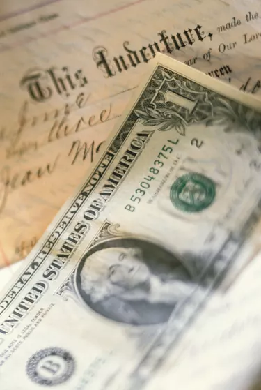 US dollar bill and contract