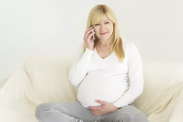 Pregnant woman relaxing on the sofa