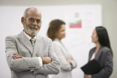 Senior African businessman with arms crossed