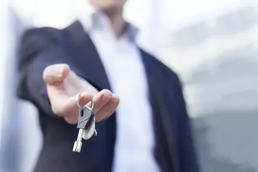 Estate agent with keys