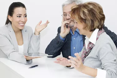 Mature Couple in Meeting With Advisor