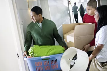 Father Helping Daughter Move into Dormitory