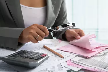 Woman checking bills