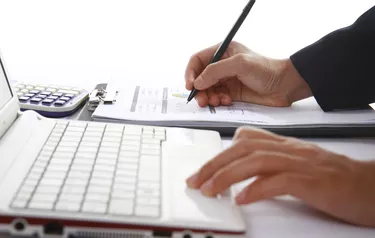 Business woman analyzing financial data