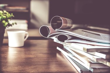 selective focus of  stacking magazine place on table in living room